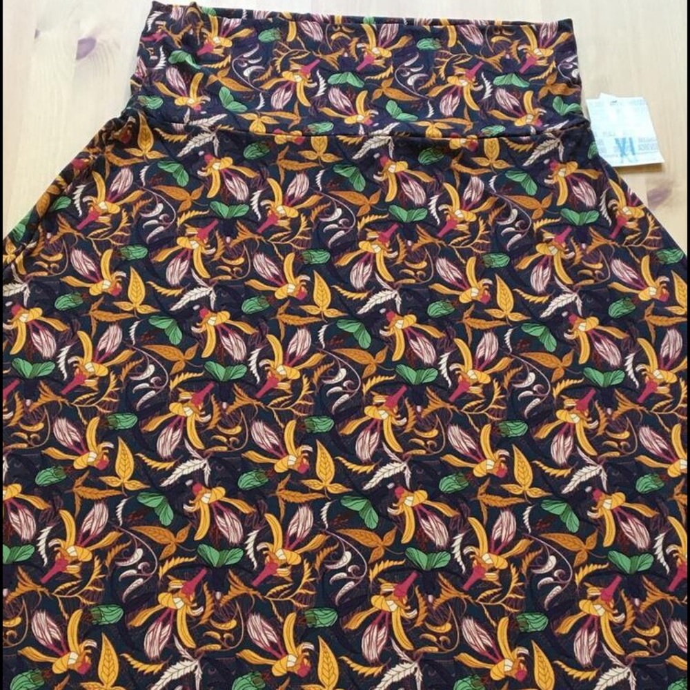 Maxi skirt, silky deep green with mustard flowers.